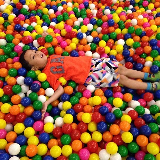 Another Pose In The Ball Pool Photograph by Dhita Primastari