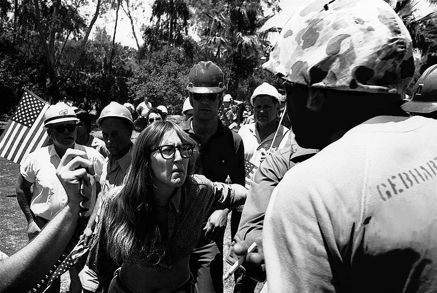 Anti-Viet Nam War protestor confronting marine pro-war march Tucson Arizona 1970 black and white Photograph by David Lee Guss