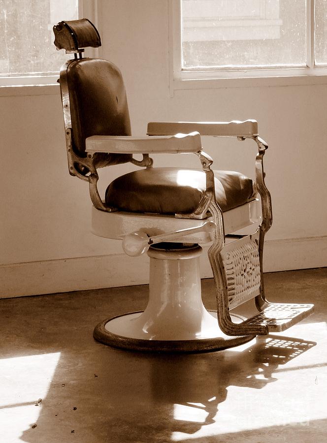 Antiquated Barber Chair in Sepia Photograph by Mary Deal