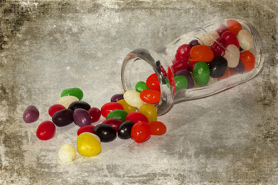 Antique Bottle And Jelly Beans Photograph by Phyllis Denton