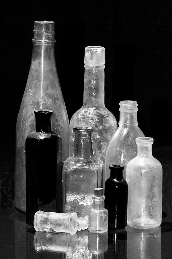 Antique Bottles 1 Black And White Photograph by Phyllis Denton