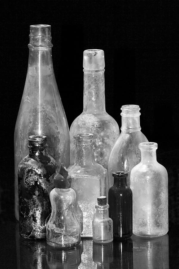 Antique Bottles 2 Black And White Photograph by Phyllis Denton