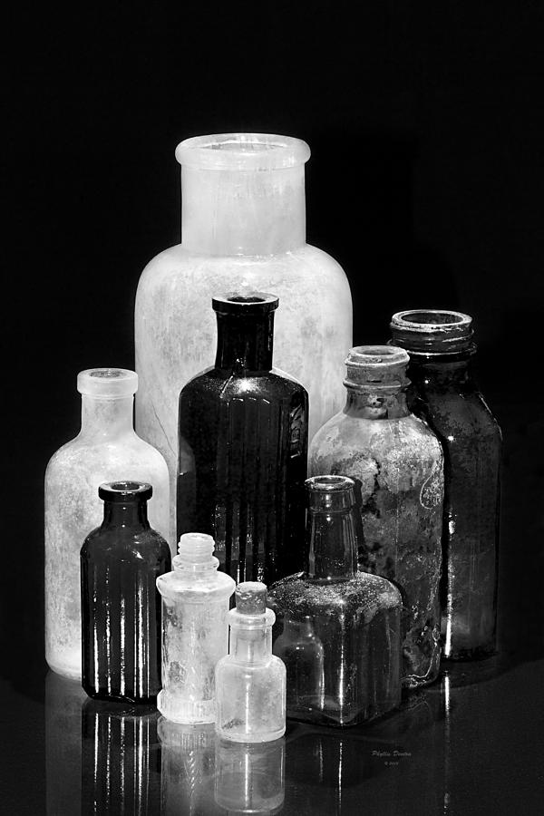 Antique Bottles 3 Black And White Photograph by Phyllis Denton