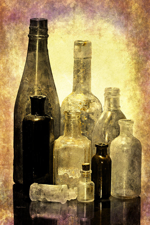 Antique Bottles From The Past Photograph by Phyllis Denton