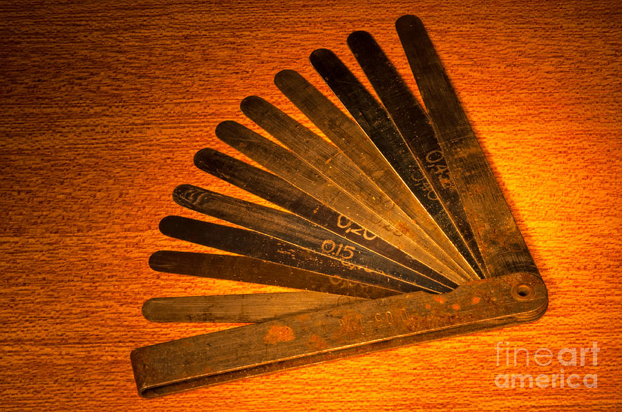 Antique gauge for measuring spark plug gaps Photograph by Les Palenik