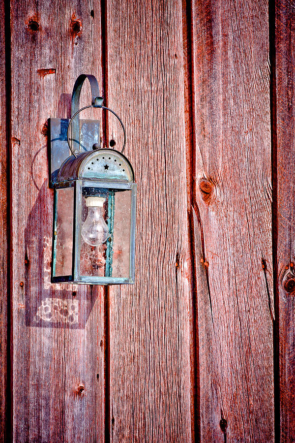 Antique Lantern On Weathered Red Barn Photograph by Jeff Sinon