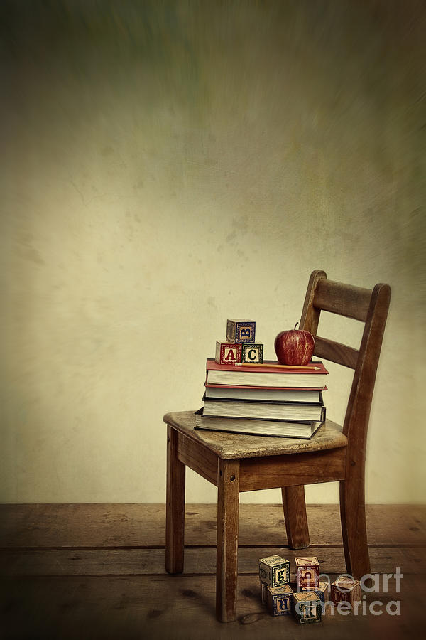Antique school chair with books and apple  Photograph by Sandra Cunningham