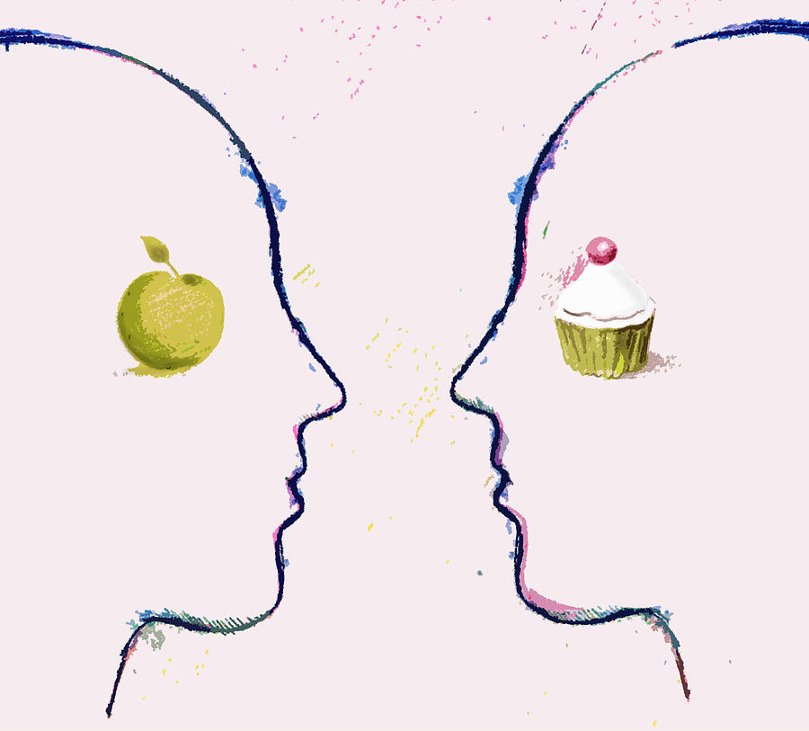 Apple And Cupcake On Contrasting Faces Photograph by Ikon Ikon Images