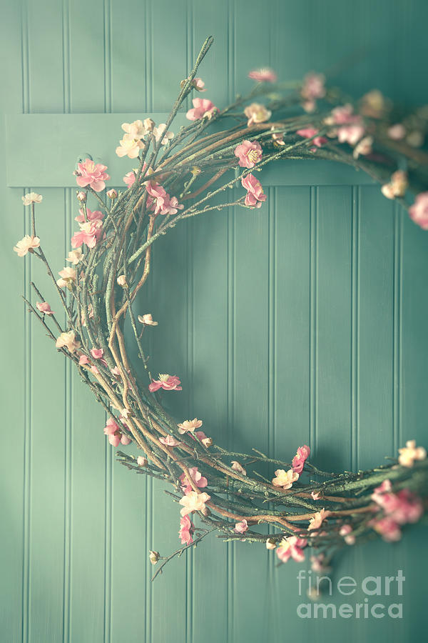 Apple blossom wreath hanging on coat hook Photograph by Sandra Cunningham