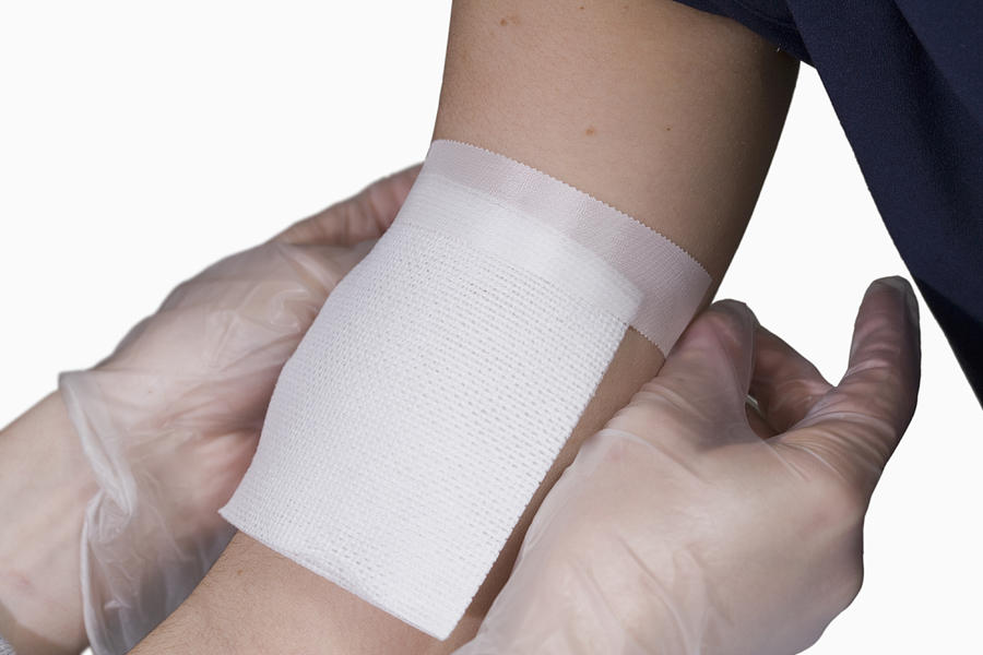 Applying Bandage Photograph by Science Stock Photography