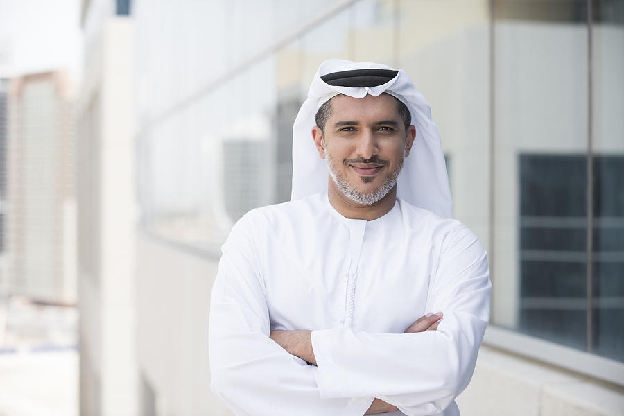 Arab businessman portrait outside office building Photograph by JohnnyGreig