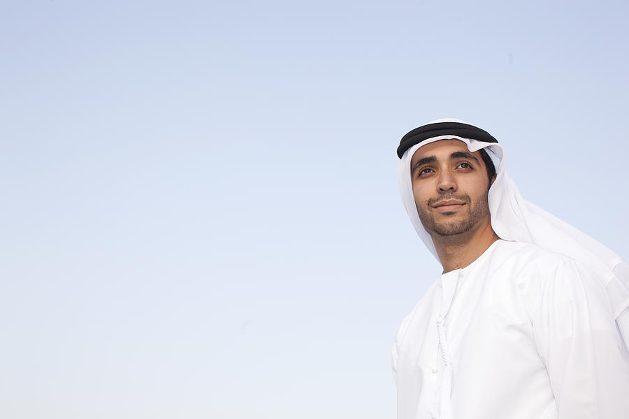 Arab man wearing dishdasha in Dubai Photograph by Gary John Norman