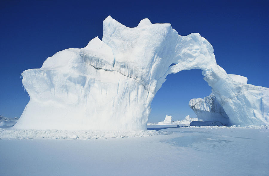 Arch In Sea Ice, Greenland Photograph by George Holton