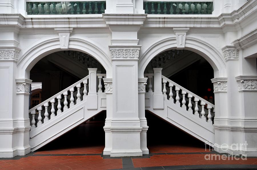 Arch staircase balustrade and columns Raffles Hotel Singapore Photograph by Imran Ahmed