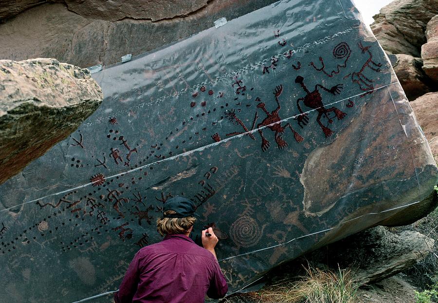 Petrified Forest National Park Photograph - Archaeologists Tracing Petroglyphs Onto Plastic by Keith Kent/science Photo Library