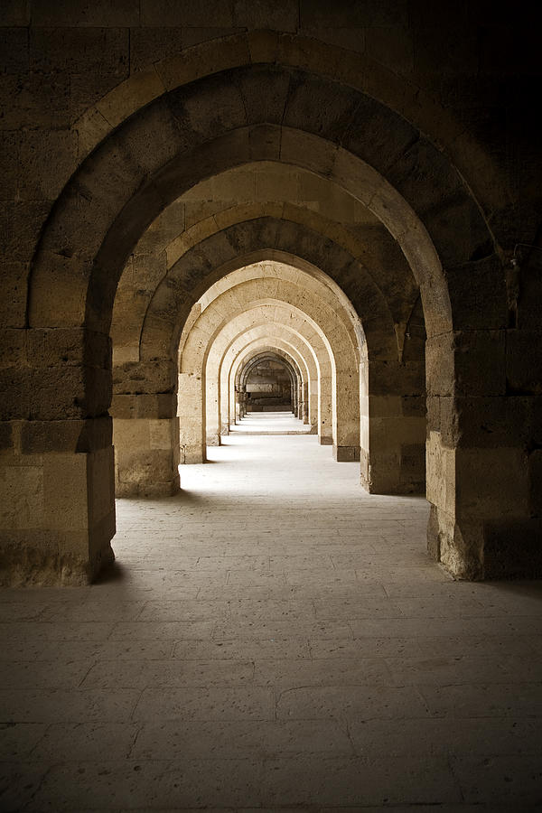 Arched colonade Photograph by Maria Heyens