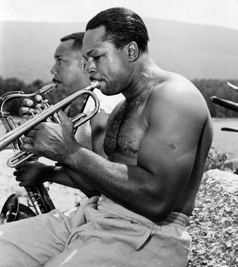 Archie Moore plays trumpet
 Photograph by The Ring Magazine