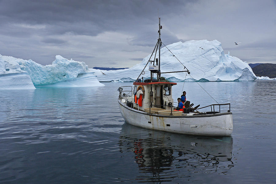 Arctic Fishermen Photograph by Michele Burgess