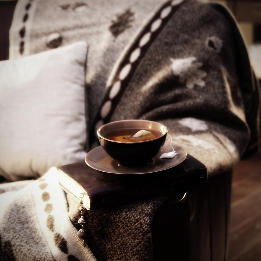 Armchair With Blanket, Book And Photograph by Images By Ania H. Photgraphy