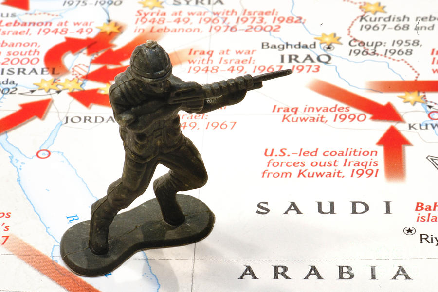 Map Photograph - Army Man standing on Middle East Conflicts Map by Amy Cicconi