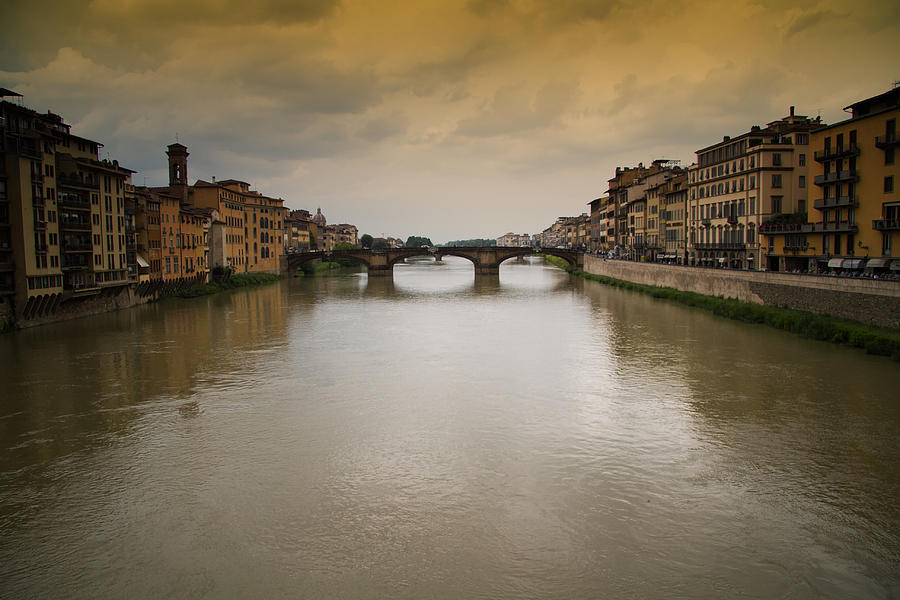 Arno River in Firenze Italy Photograph by Roger Mullenhour