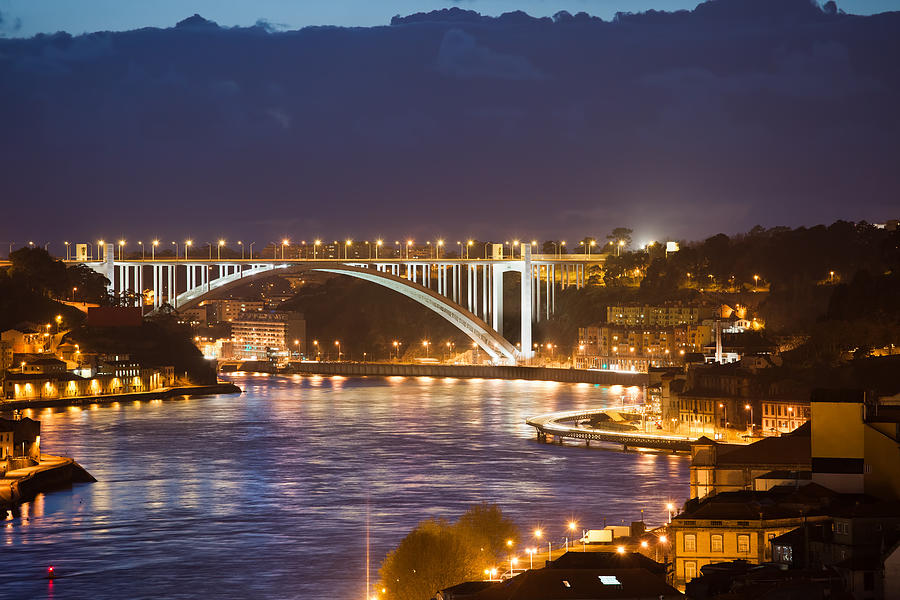 Arrabida Bridge at Night in Porto and Gaia Photograph by Artur Bogacki