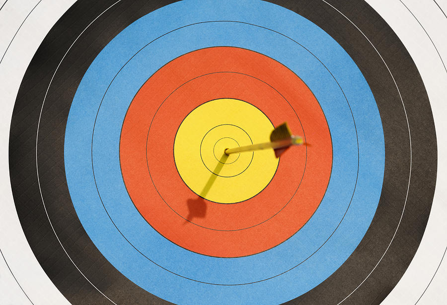 Arrow lodged in bulls-eye Photograph by Jacobs Stock Photography Ltd