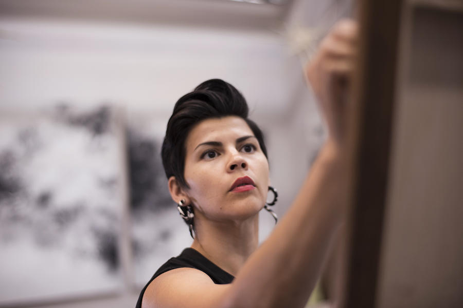 Artist painting in her studio Photograph by Scott Zdon