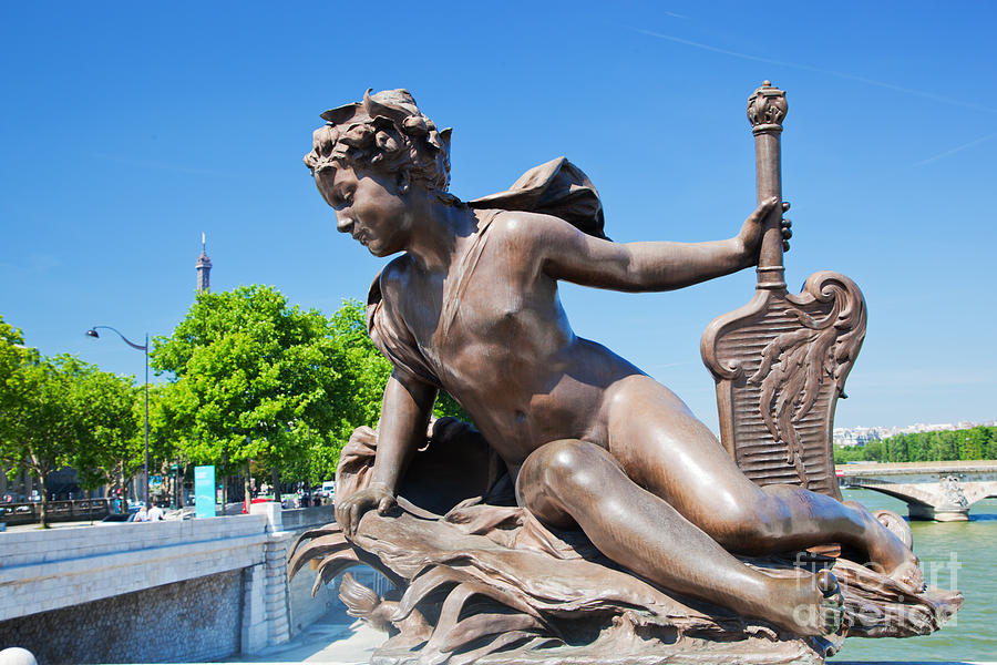 Artistic Statue On Alexandre Bridge Against Eiffel Tower Photograph