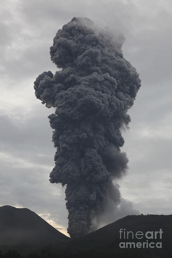 Ash Cloud Rising From Tompaluan Crater Photograph