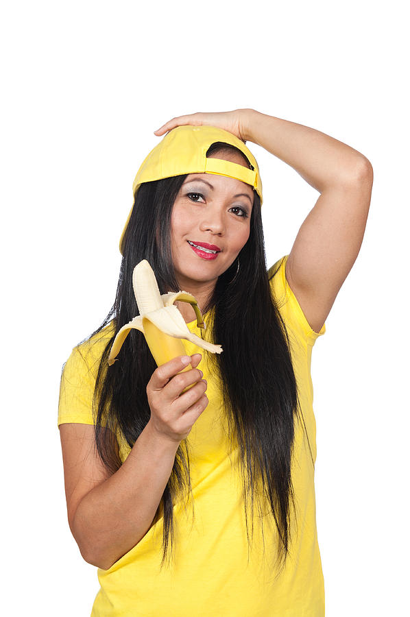 Asian Woman Eating A Banana Photograph By Joe Belanger 