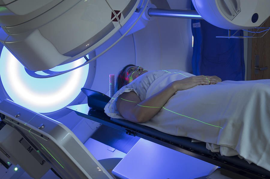 Asian Woman receiving Radiation Therapy Treatments for Cancer Photograph by Mark Kostich