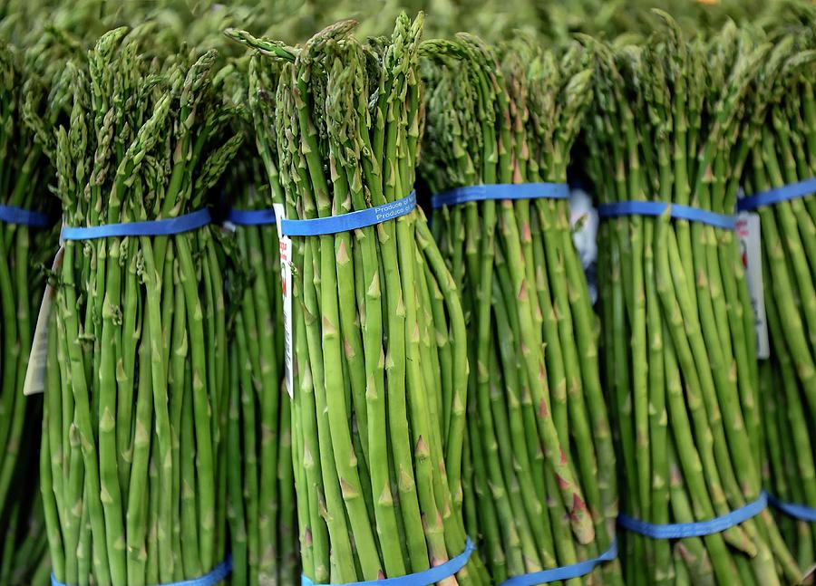 Asparagus For Sale At A Farmers Market Photograph by John Greim/science Photo Library