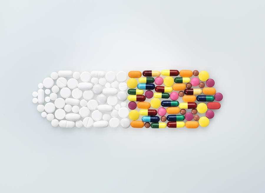 Assorted medical pills and tablets in shape of drug capsule Photograph by Andrew Brookes