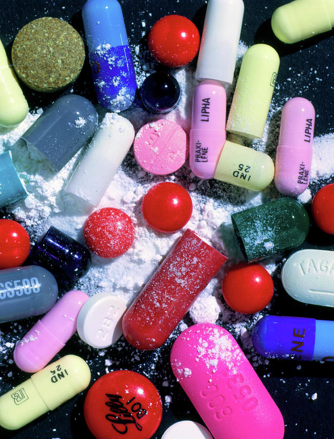 Assorted Pills With Opened Photograph by Garry Watson/science Photo Library