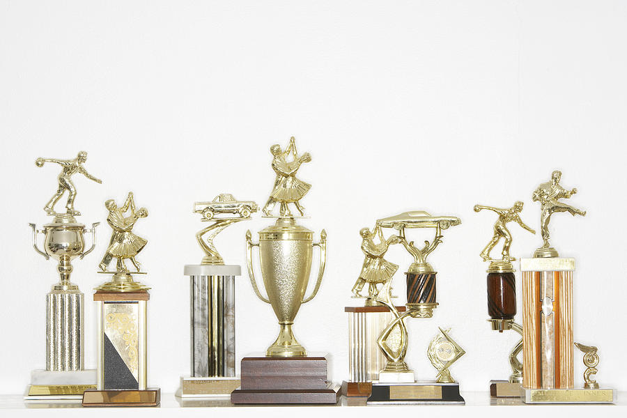 Assorted trophies Photograph by Noel Hendrickson