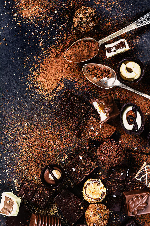 Assortment of chocolates, chocolate bars, truffles and pralines Photograph by Arx0nt