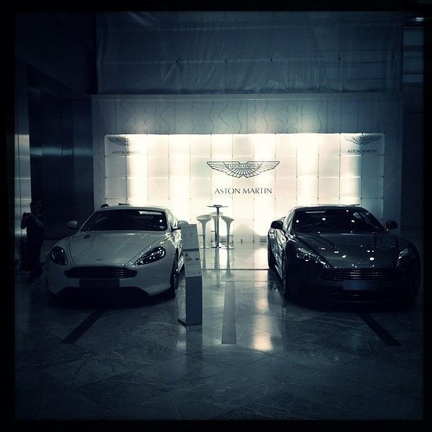 W40 Photograph - Aston Martin (left) Db9 & (right) by Drew Gibson