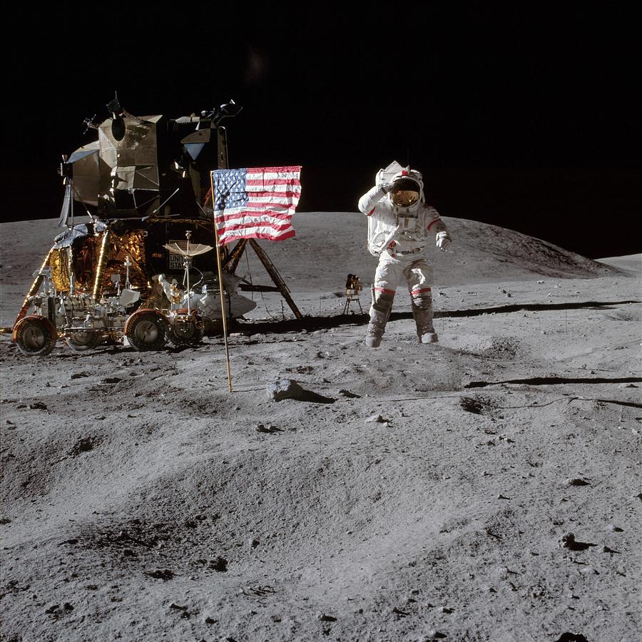 Astronaut saluting the American flag during Apollo 16 Mission Photograph by Celestial Images