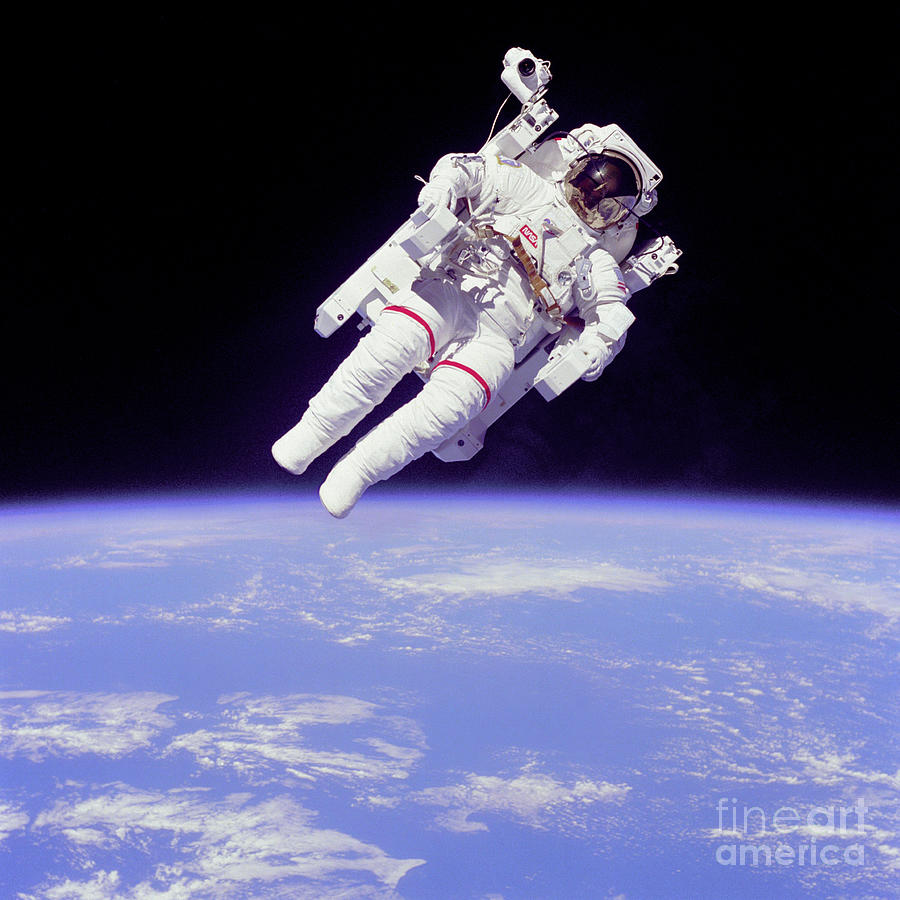 Astronaut space walk Photograph by Celestial Images