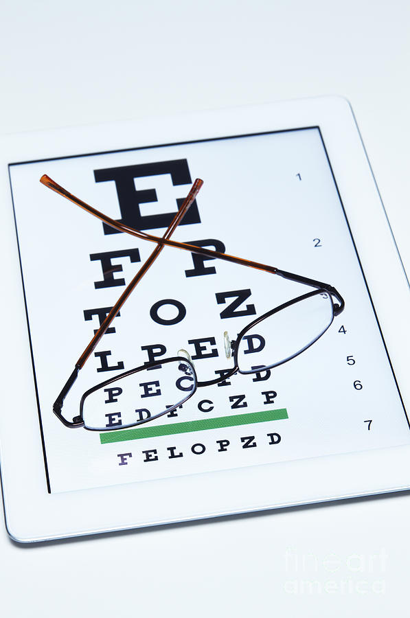 At-home Eye Test Photograph by GIPhotoStock