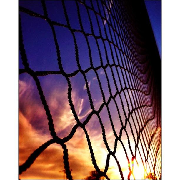 Sunset Photograph - At The Ball Field. Sun Setting by Marcus Friedhofer
