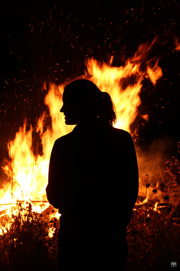 At the bonfire Photograph by John Meader