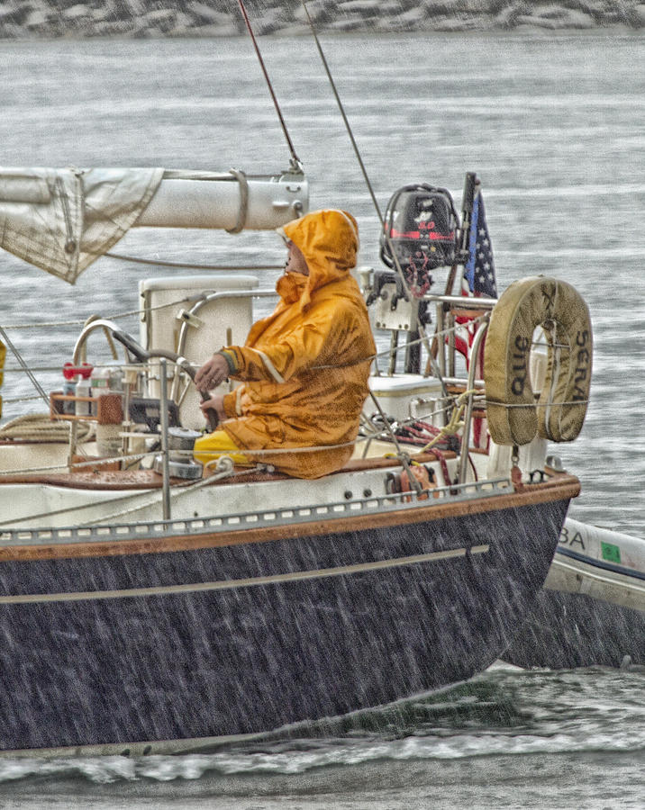 At The Helm In The Rain Photograph by Constantine Gregory