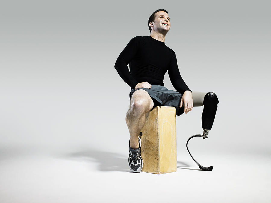 Athlete with prosthetic leg Photograph by Image Source