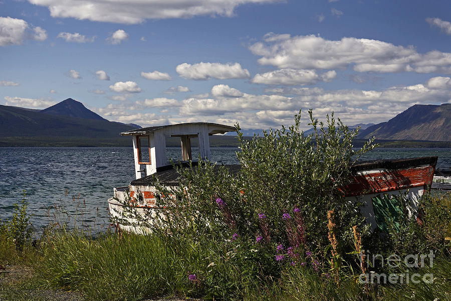 Atlin Lake and boats Photograph by Inge Riis McDonald