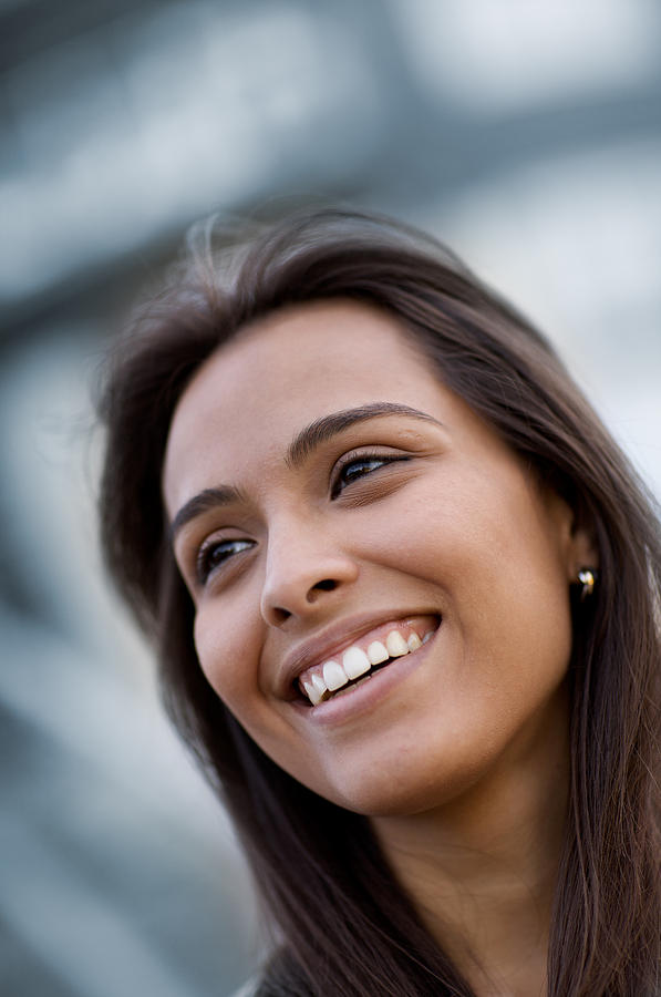 Attractive smiling Hispanic woman Photograph by Billnoll