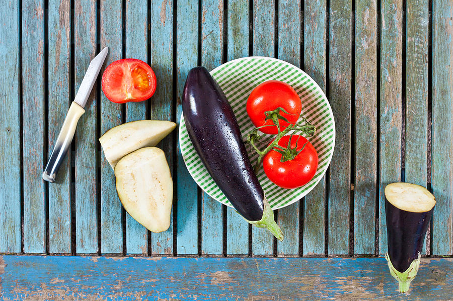 Tomato Photograph - Aubergines and tomatoes by Tom Gowanlock