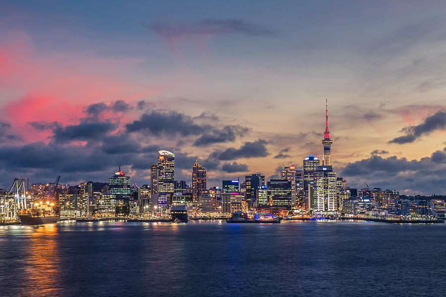 Auckland city with dramatic sunset sky Photograph by Nchant