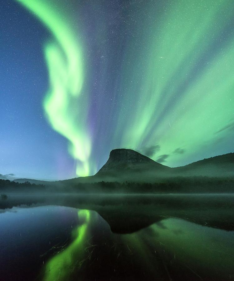 Aurora Borealis Over A Mountain Photograph by Tommy Eliassen/science Photo Library